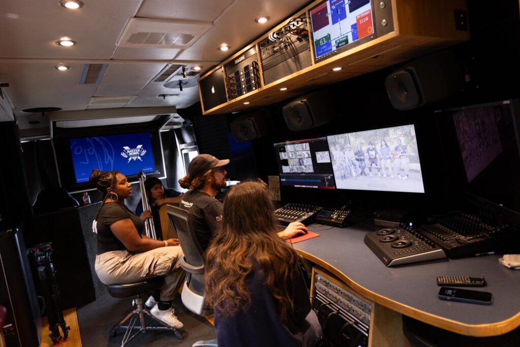 kids making music inside the Lennon Bus